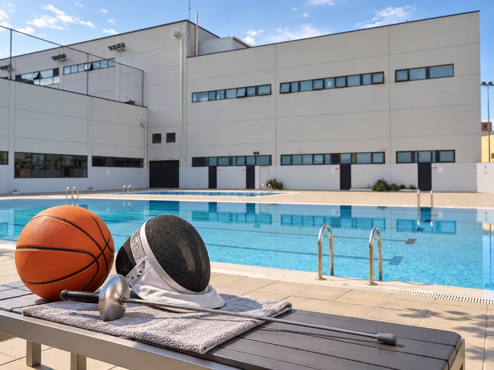 AI-generated illustration: Benimaclet poolside with a basketball, fencing mask and practice foil arranged for a summer sports camp.